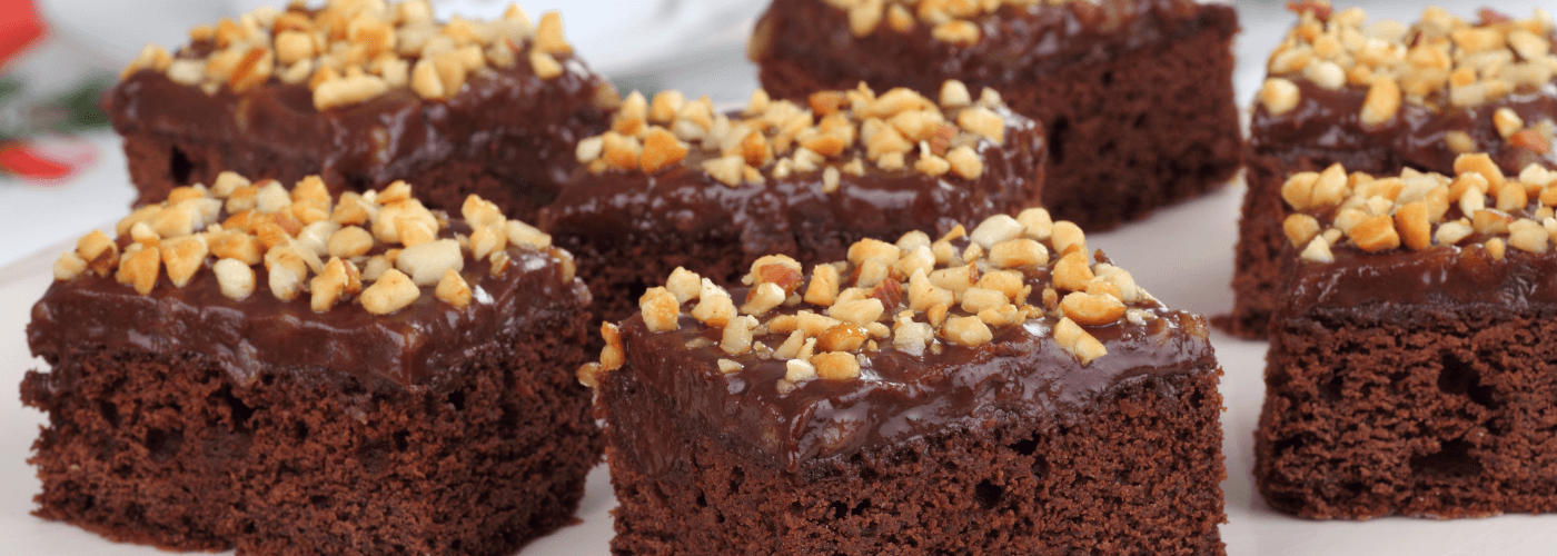 Brownies garnished with nuts on top
