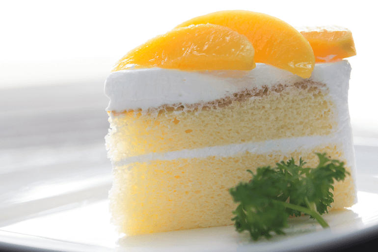 super lite sponge cake with orange pieces on top
