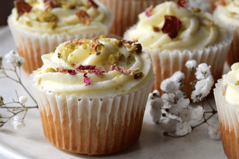 Rasmalai cupcakes topped with pista cuts