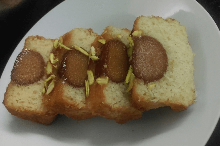 Slices of Gulab Jamun Cake served in Plate