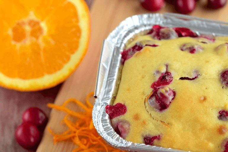 Orange Cranberry Cake garnished with Cake and Cranberry