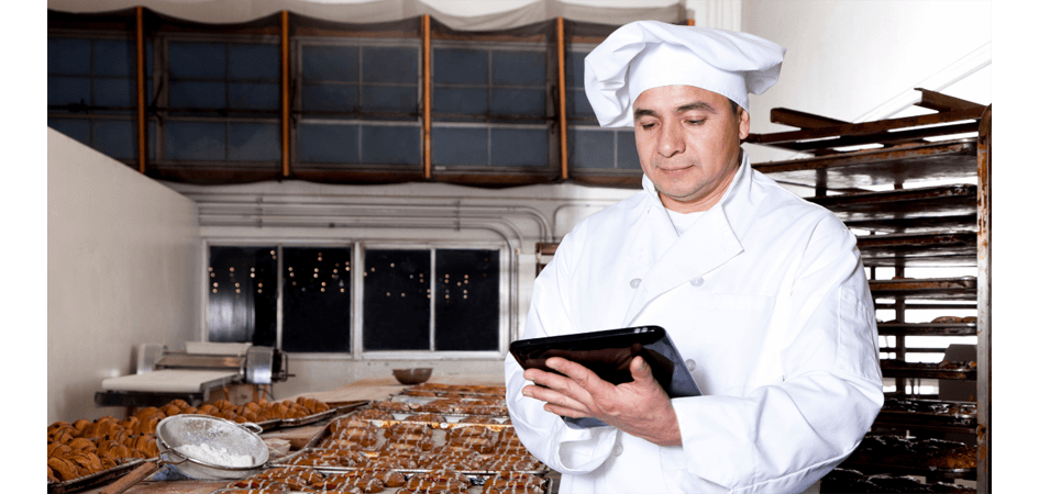 chef holding tablet